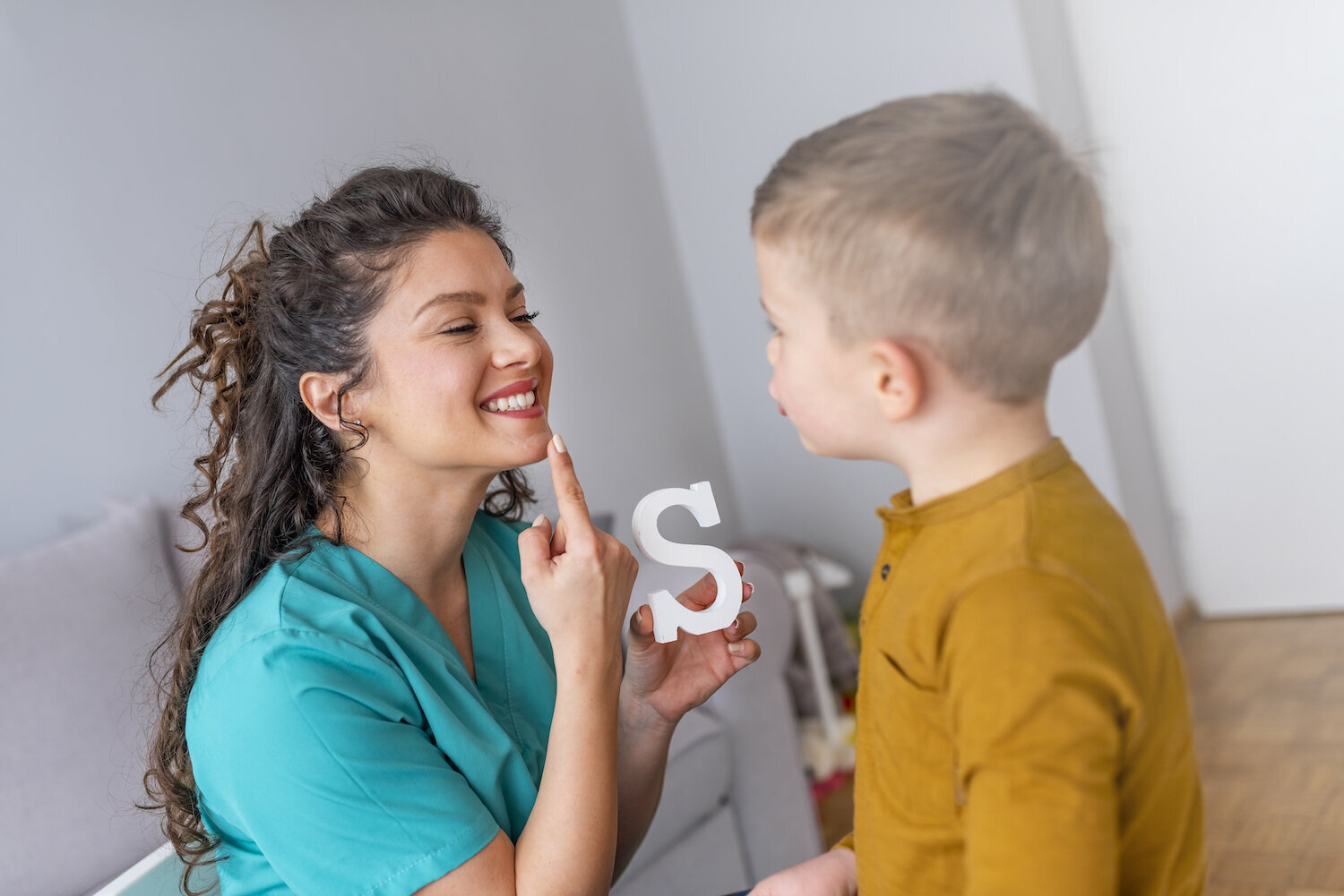 Therapist and child working together